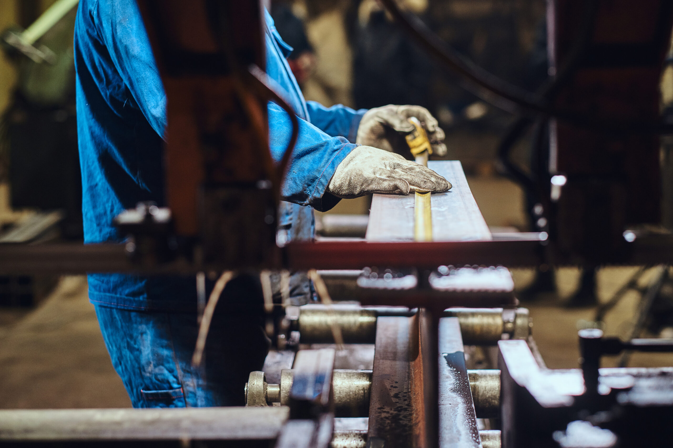 man is working at metal factory
